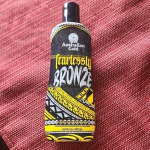 Australian Gold Fearlessly Bronze Suncare Lotion - Black and Yellow